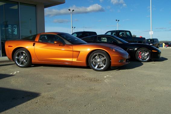 The near car is the completed STS twinturbo 2007 Corvette